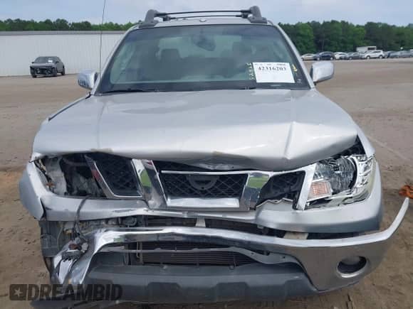 2011 Nissan Frontier Pro-4X z VIN 1N6AD0EV6BC427890, wystawiony jako IAAI lot #42316203 z przebiegiem 259 337 mil mil oraz . Historia ofert i sprzedaży dostępna na DreamBid. Obrazek 12.