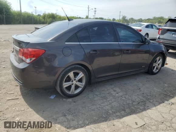 2014 Chevrolet Cruze 2LT z VIN 1G1PE5SB0E7384574, wystawiony jako Copart lot #68142205 z przebiegiem 182 916 mil mil oraz Czysty tytuł • Clean title. Historia ofert i sprzedaży dostępna na DreamBid. Obrazek 3.