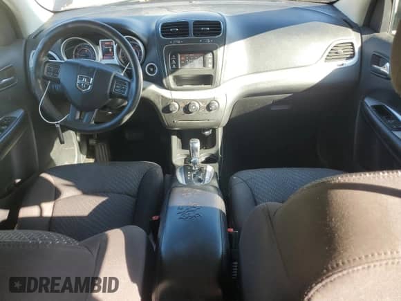 2014 Dodge Journey SXT with VIN 3C4PDCBG9ET142064, listed as a Copart auction lot 84588885 with 168,463 mi miles and Salvage title. Bid and sale history available at DreamBid. Image 8.