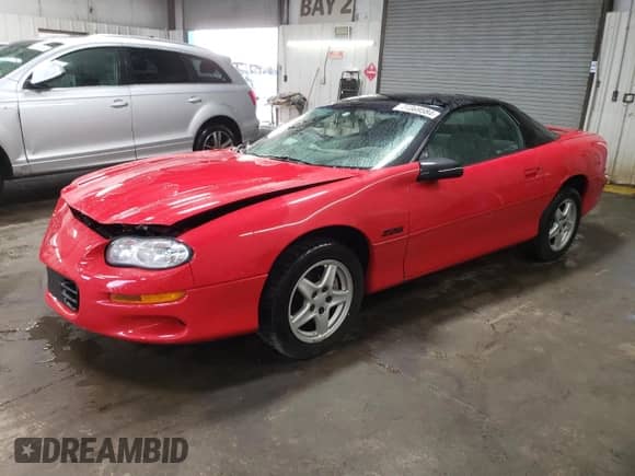 1998 Chevrolet Camaro Z28 с VIN 2G1FP22G8W2135870, выставлен на аукционе Copart как лот 77369584 с пробегом 41 057 миль миль и Списание • Salvage title. История ставок и продаж доступна на DreamBid. Изображение 1.