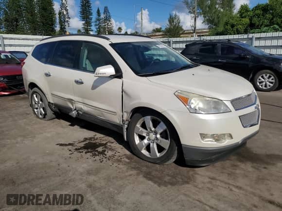 2012 Chevrolet Traverse LTZ с VIN 1GNKVLED6CJ365036, выставлен на аукционе Copart как лот 81832905 с пробегом 141 248 миль миль и Списание • Salvage title. История ставок и продаж доступна на DreamBid. Изображение 4.