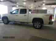 2013 GMC Sierra 1500 SLT с VIN 3GTP2WE79DG156685, выставлен на аукционе Copart как лот 55599185 с пробегом 220 968 миль миль и Списание • Salvage title. История ставок и продаж доступна на DreamBid. Изображение 2.