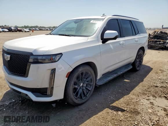 2023 Cadillac Escalade 4WD Sport with VIN 1GYS4FKL9PR124937, listed as a Copart auction lot 66909685 with 22,610 mi miles and Salvage title. Bid and sale history available at DreamBid. Image 1.