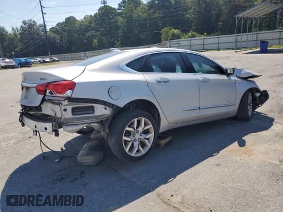 2018 Chevrolet Impala Premier с VIN 2G1125S30J9135000, выставлен на аукционе Copart как лот 70460385 с пробегом Не указан миль и Списание • Salvage title. История ставок и продаж доступна на DreamBid. Изображение 3.