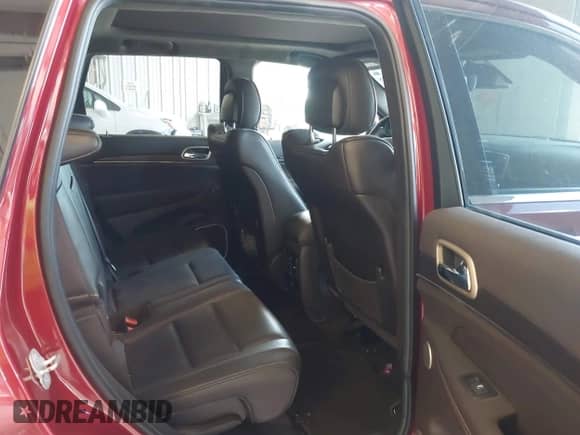 2014 Jeep Grand Cherokee Summit with VIN 1C4RJFJM6EC418853, listed as a IAAI auction lot 42787628 with 80,435 mi miles and . Bid and sale history available at DreamBid. Image 8.