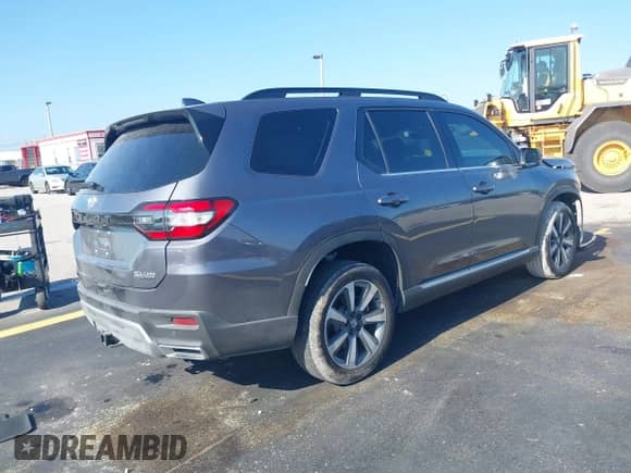 2025 Honda Pilot Touring с VIN 5FNYG2H72SB014420, выставлен на аукционе IAAI как лот 42332505 с пробегом 20 172 миль миль и . История ставок и продаж доступна на DreamBid. Изображение 4.