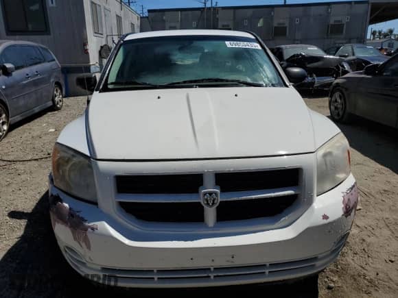 2007 Dodge Caliber with VIN 1B3HB28B47D258301, listed as a Copart auction lot 69850435 with 216,387 mi miles and Clean title. Bid and sale history available at DreamBid. Image 5.