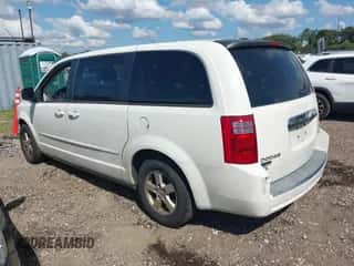2009 Dodge Grand Caravan SE with VIN 2D8HN44E19R575827, listed as a IAAI auction lot 42812571 with 165,084 mi miles and . Bid and sale history available at DreamBid. Image 3.