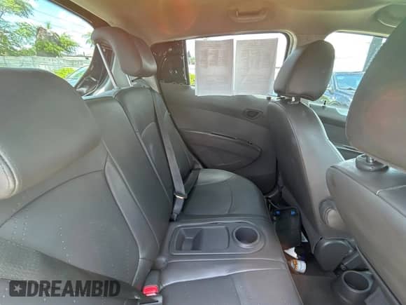2016 Chevrolet Spark LT z VIN KL8CL6S07GC595435, wystawiony jako Copart lot #64610015 z przebiegiem 58 575 mil mil oraz Czysty tytuł • Clean title. Historia ofert i sprzedaży dostępna na DreamBid. Obrazek 6.