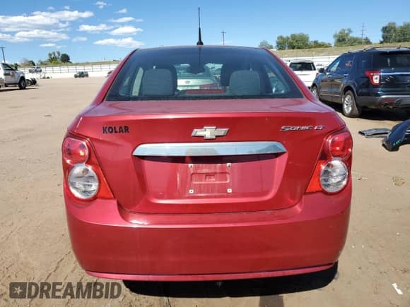 2012 Chevrolet Sonic LT z VIN 1G1JC5SH8C4174741, wystawiony jako Copart lot #85367645 z przebiegiem 89 897 mil mil oraz Czysty tytuł • Clean title. Historia ofert i sprzedaży dostępna na DreamBid. Obrazek 6.