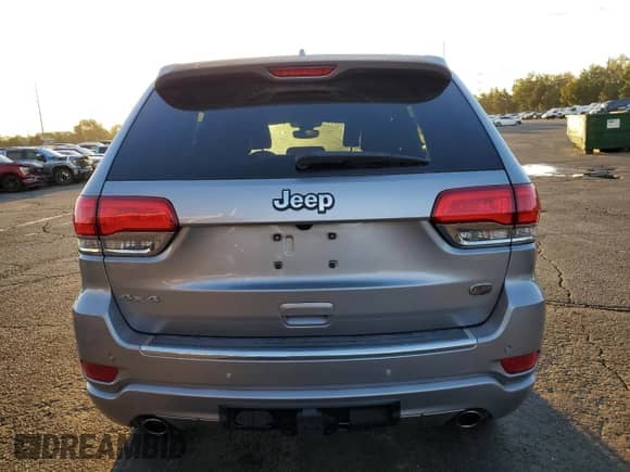 2017 Jeep Grand Cherokee Overland with VIN 1C4RJFCGXHC756588, listed as a Copart auction lot 84282675 with 101,960 mi miles and Salvage title. Bid and sale history available at DreamBid. Image 6.