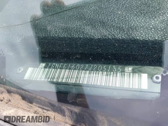 2007 Chevrolet Suburban LS z VIN 1GNFC16027J205135, wystawiony jako IAAI lot #42468141 z przebiegiem Nie podano mil oraz . Historia ofert i sprzedaży dostępna na DreamBid. Obrazek 9.