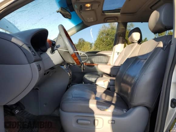 2006 Toyota Sienna XLE z VIN 5TDBA22C76S074255, wystawiony jako Copart lot #71065935 z przebiegiem 216 218 mil mil oraz Szkoda całkowita • Salvage title. Historia ofert i sprzedaży dostępna na DreamBid. Obrazek 7.