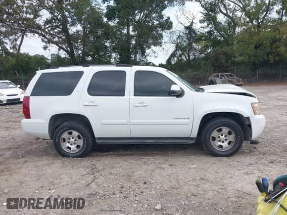 2007 Chevrolet Tahoe LS z VIN 1GNFC13017J290263, wystawiony jako IAAI lot #43319938 z przebiegiem 230 704 mil mil oraz . Historia ofert i sprzedaży dostępna na DreamBid. Obrazek 14.