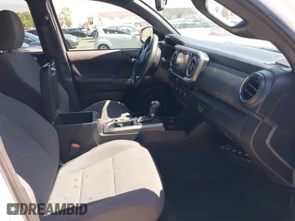 2017 Toyota Tacoma SR5 with VIN 3TMAZ5CN1HM037971, listed as a IAAI auction lot 42658632 with 67,228 mi miles and . Bid and sale history available at DreamBid. Image 5.