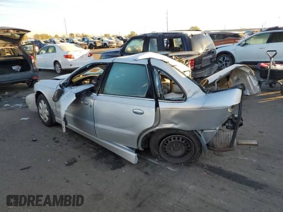 2004 Saturn L L300 1 with VIN 1G8JC54F34Y510089, listed as a Copart auction lot 79877034 with Not provided miles and Non repairable. Bid and sale history available at DreamBid. Image 2.