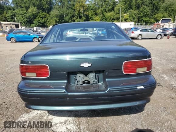 1994 Chevrolet Caprice с VIN 1G1BN52W0RR108855, выставлен на аукционе Copart как лот 70860985 с пробегом 124 554 миль миль и Списание • Salvage title. История ставок и продаж доступна на DreamBid. Изображение 6.