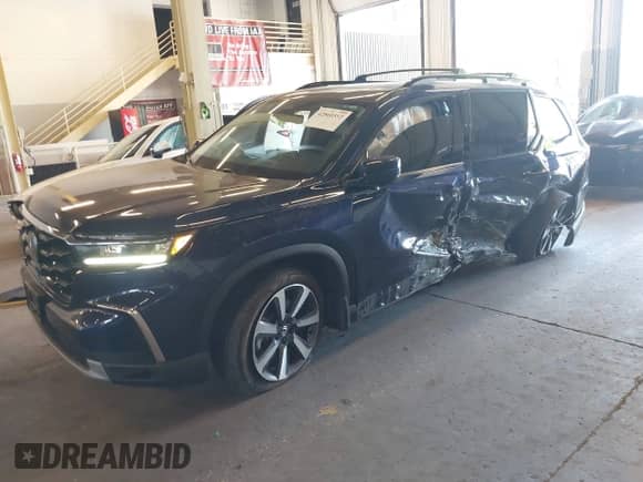 2023 Honda Pilot Touring с VIN 5FNYG1H72PB042624, выставлен на аукционе IAAI как лот 42860512 с пробегом 37 495 миль миль и . История ставок и продаж доступна на DreamBid. Изображение 2.