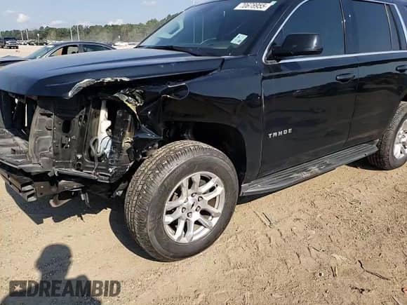 2020 Chevrolet Tahoe LT with VIN 1GNSCBKC1LR307557, listed as a Copart auction lot 70678955 with 106,437 mi miles and Salvage title. Bid and sale history available at DreamBid. Image 15.