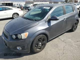 2012 Chevrolet Sonic LTZ с VIN 1G1JF6SB0C4174080, выставлен на аукционе Copart как лот 79336874 с пробегом 147 609 миль миль и Чистый • Clean title. История ставок и продаж доступна на DreamBid. Изображение 1.