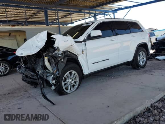 2018 Jeep Grand Cherokee Laredo z VIN 1C4RJEAG7JC480700, wystawiony jako Copart lot #56788835 z przebiegiem Nie podano mil oraz Szkoda całkowita • Salvage title. Historia ofert i sprzedaży dostępna na DreamBid. Obrazek 1.
