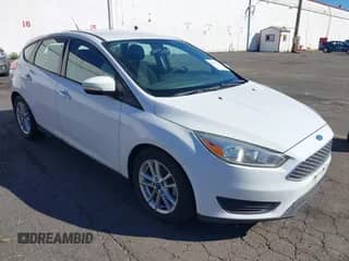 2015 Ford Focus SE z VIN 1FADP3K22FL306921, wystawiony jako IAAI lot #43373189 z przebiegiem 129 112 mil mil oraz . Historia ofert i sprzedaży dostępna na DreamBid. Obrazek 1.