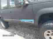 1994 Chevrolet Suburban z VIN 1GNGK26F1RJ333774, wystawiony jako IAAI lot #42878056 z przebiegiem 246 887 mil mil oraz . Historia ofert i sprzedaży dostępna na DreamBid. Obrazek 6.