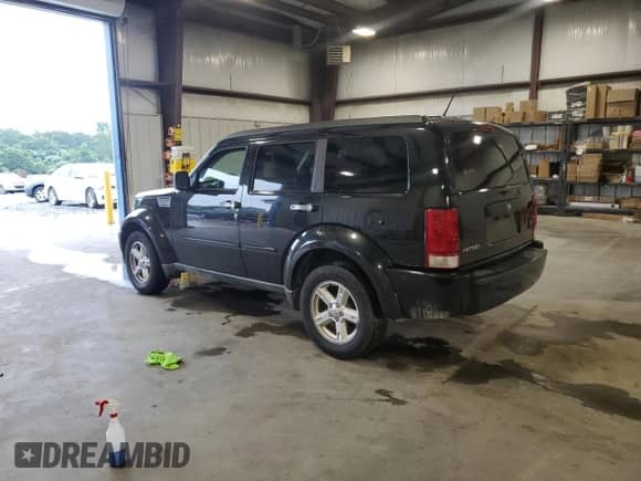 2008 Dodge Nitro SXT with VIN 1D8GT28K58W117204, listed as a Copart auction lot 67197825 with 185,175 mi miles and Salvage title. Bid and sale history available at DreamBid. Image 2.