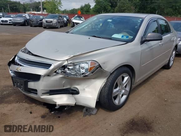 2012 Chevrolet Malibu 1LS z VIN 1G1ZB5E04CF206553, wystawiony jako IAAI lot #42997099 z przebiegiem 66 712 mil mil oraz . Historia ofert i sprzedaży dostępna na DreamBid. Obrazek 6.