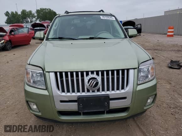 2009 Mercury Mariner Hybrid with VIN 4M2CU29379KJ13787, listed as a Copart auction lot 70720545 with 149,923 mi miles and Salvage title. Bid and sale history available at DreamBid. Image 5.