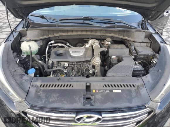 2016 Hyundai Tucson Sport z VIN KM8J33A27GU183117, wystawiony jako Copart lot #81871985 z przebiegiem 106 286 mil mil oraz Szkoda całkowita • Salvage title. Historia ofert i sprzedaży dostępna na DreamBid. Obrazek 12.