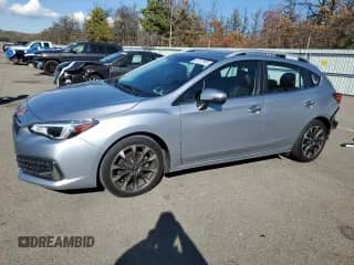 2021 Subaru Impreza Limited with VIN 4S3GTAU63M3709343, listed as a Copart auction lot 87017965 with 26,443 mi miles and Salvage title. Bid and sale history available at DreamBid. Image 1.