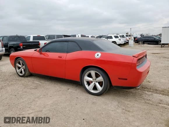 2009 Dodge Challenger SRT-8 с VIN 2B3LJ74W49H549308, выставлен на аукционе Copart как лот 70901665 с пробегом 84 813 миль миль и Чистый • Clean title. История ставок и продаж доступна на DreamBid. Изображение 2.