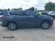 2021 Hyundai Santa Fe SE z VIN 5NMS14AJ4MH322800, wystawiony jako IAAI lot #42923868 z przebiegiem 104 124 mil mil oraz . Historia ofert i sprzedaży dostępna na DreamBid. Obrazek 13.