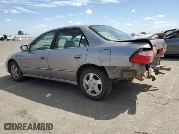 2000 Honda Accord EX with VIN JHMCG6681YC010506, listed as a Copart auction lot 72081805 with 201,896 mi miles and Salvage title. Bid and sale history available at DreamBid. Image 2.