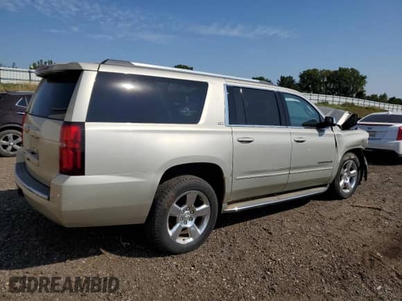 2015 Chevrolet Suburban LTZ z VIN 1GNSKKKC8FR245890, wystawiony jako Copart lot #80150495 z przebiegiem 216 132 mil mil oraz Czysty tytuł • Clean title. Historia ofert i sprzedaży dostępna na DreamBid. Obrazek 3.