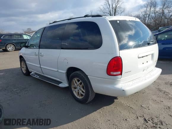 1998 Dodge Caravan LE with VIN 1B4GP54L7WB698340, listed as a IAAI auction lot 41252162 with 99,073 mi miles and . Bid and sale history available at DreamBid. Image 3.