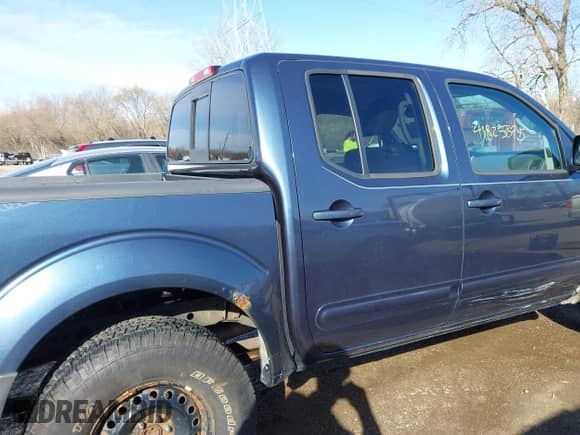 2014 Nissan Frontier S with VIN 1N6AD0EV7EN769521, listed as a IAAI auction lot 41825375 with 102,792 mi miles and . Bid and sale history available at DreamBid. Image 14.