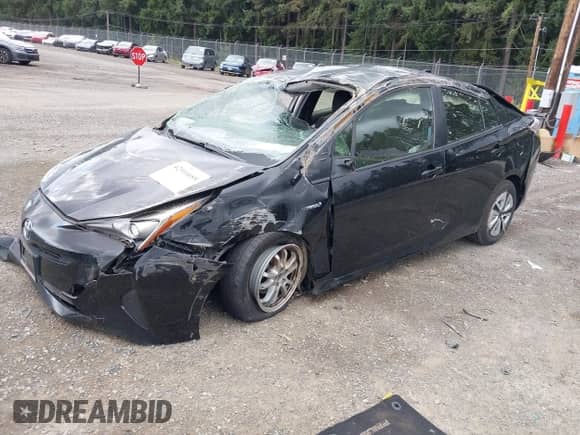 2016 Toyota Prius Two with VIN JTDKBRFU8G3011001, listed as a IAAI auction lot 42910688 with 129,322 mi miles and . Bid and sale history available at DreamBid. Image 2.