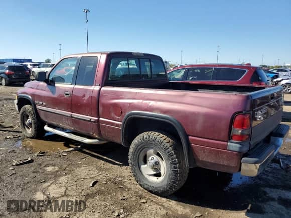 2001 Dodge 1500 z VIN 3B7HF13Z61M275713, wystawiony jako Copart lot #74197304 z przebiegiem 193 959 mil mil oraz Szkoda całkowita • Salvage title. Historia ofert i sprzedaży dostępna na DreamBid. Obrazek 2.