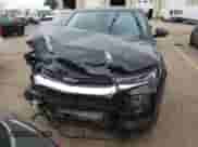 2023 Chevrolet TrailBlazer LS with VIN KL79MNSL1PB048425, listed as a Copart auction lot 77702014 with 18,707 mi miles and Salvage title. Bid and sale history available at DreamBid. Image 5.