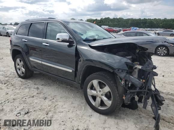 2013 Jeep Grand Cherokee Limited с VIN 1C4RJFBG9DC633229, выставлен на аукционе Copart как лот 67676525 с пробегом 147 048 миль миль и Списание • Salvage title. История ставок и продаж доступна на DreamBid. Изображение 4.