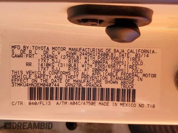 2014 Toyota Tacoma PreRunner with VIN 3TMKU4HN3EM040744, listed as a Copart auction lot 71853915 with 140,505 mi miles and Salvage title. Bid and sale history available at DreamBid. Image 13.