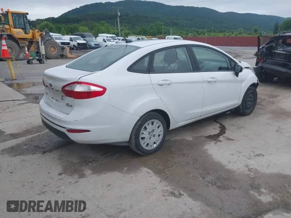 2016 Ford Fiesta S with VIN 3FADP4AJ4GM103897, listed as a IAAI auction lot 42523789 with 166,101 mi miles and . Bid and sale history available at DreamBid. Image 4.