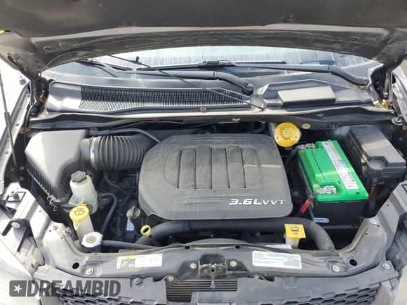 2016 Dodge Grand Caravan R/T with VIN 2C4RDGEG5GR209471, listed as a Copart auction lot 70827925 with 129,466 mi miles and Salvage title. Bid and sale history available at DreamBid. Image 12.