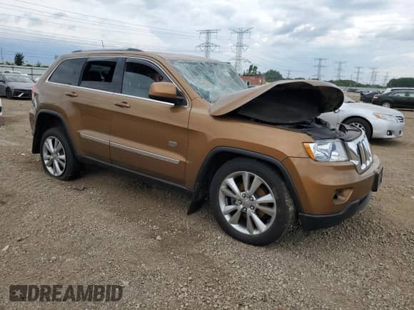 2011 Jeep Grand Cherokee 70th Anniversary with VIN 1J4RR4GG6BC646162, listed as a Copart auction lot 64792705 with Not provided miles and Salvage title. Bid and sale history available at DreamBid. Image 4.