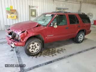 2002 Chevrolet Blazer LS с VIN 1GNDT13W62K198175, выставлен на аукционе Copart как лот 71952095 с пробегом 130 525 миль миль и Списание • Salvage title. История ставок и продаж доступна на DreamBid. Изображение 1.