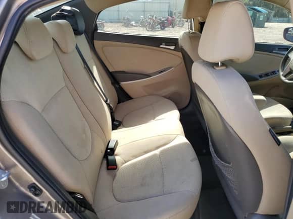 2014 Hyundai Accent GLS z VIN KMHCT4AEXEU591164, wystawiony jako Copart lot #82646655 z przebiegiem 135 583 mil mil oraz Czysty tytuł • Clean title. Historia ofert i sprzedaży dostępna na DreamBid. Obrazek 10.