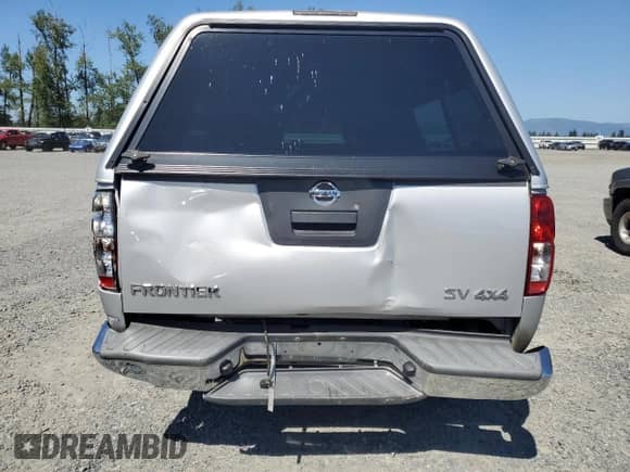 2012 Nissan Frontier SV with VIN 1N6AD0FV0CC428632, listed as a Copart auction lot 68339175 with 97,960 mi miles and Salvage title. Bid and sale history available at DreamBid. Image 6.