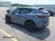 2022 Mazda CX-5 S Preferred z VIN JM3KFBCM9N0584253, wystawiony jako IAAI lot #42142889 z przebiegiem 77 104 mil mil oraz . Historia ofert i sprzedaży dostępna na DreamBid. Obrazek 3.
